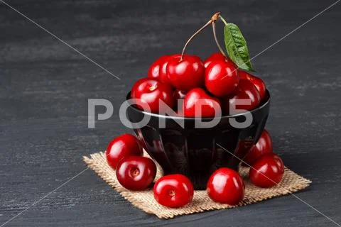 Fresh cherries in bowl Stock Photos
