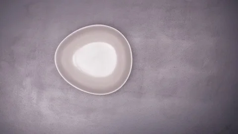 Fresh cherries in bowl on table stop motion Stock Footage 77226527
