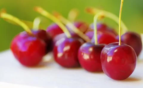 Fresh cherries on table Stock Photos
