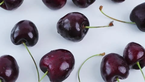 Fresh cherries on white background. Healthy food advertising. 4k Vídeos de archivo 342964243