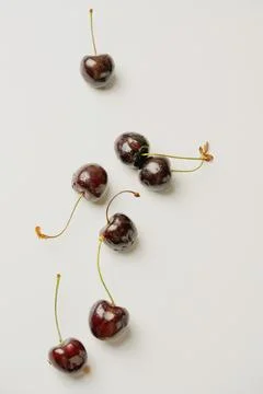 Fresh cherries on the white background Stock Photos