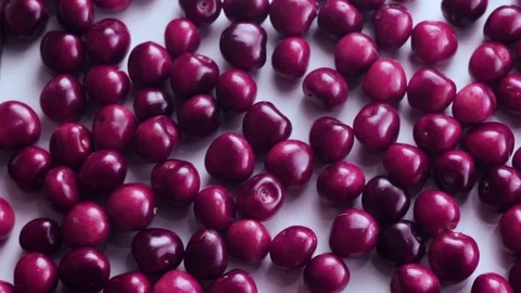 Fresh cherries on the white background. Top view Stock Footage 77212174