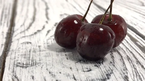 Fresh cherry bunch berries group of ripe juicy dark red cherry rotate red cherry Stock Footage 106023982
