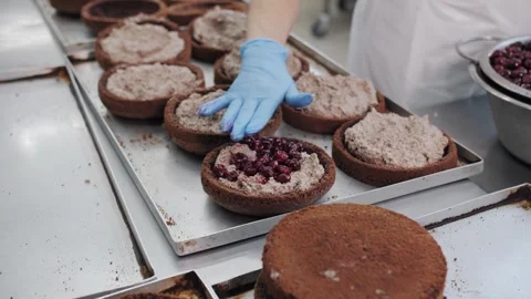 Fresh Cherry Cake Assembly in a Professional Bakery. Confectionery production Stock Footage 321808758