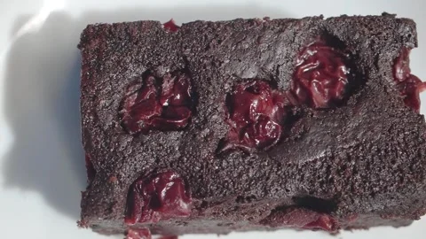 Fresh cherry chocolate loaf on a white plate Stock Footage 334273649