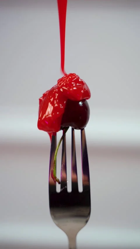 Fresh Cherry with Glossy Red Syrup Drizzle Stock Footage 336921702