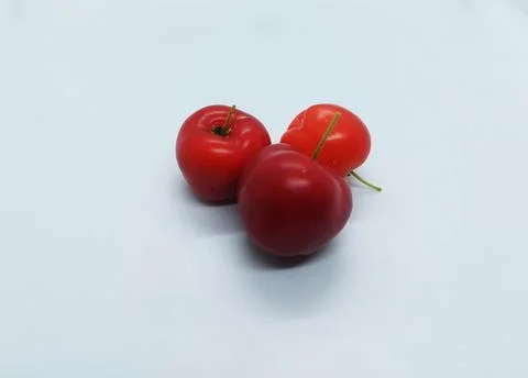 Fresh cherry isolated in white background Stock Photos