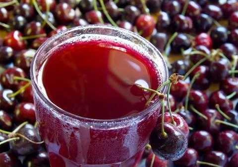 Fresh cherry juice Stock Photos