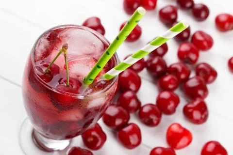 Fresh cherry juice Stock Photos