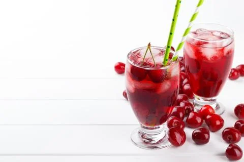Fresh cherry juice Stock Photos