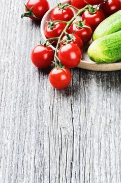 Fresh cherry tomatoes and cucumbers Foto stock
