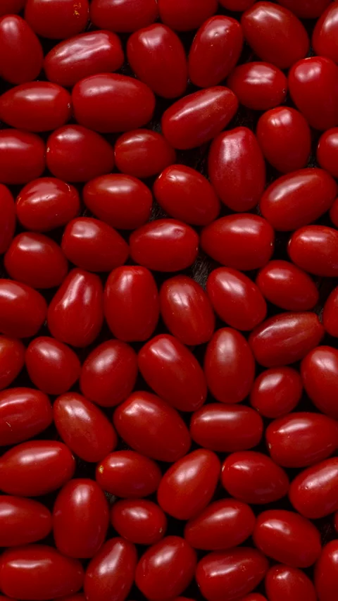 Fresh cherry tomatoes background texture. Vertical video. Stock Footage 300949265