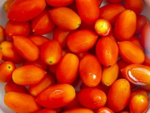 Fresh cherry tomatoes close-up Stock Photos