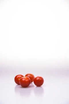 Fresh cherry tomatoes group isolated on white background cutout Stock Photos