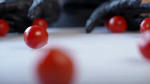 Fresh Cherry Tomatoes Held in Hands, Perfectly Prepared and Ready for Creative Stock Footage 296631478