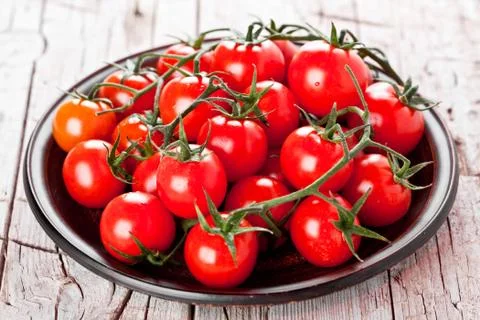 Fresh cherry tomatoes Stock Photos