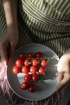 Fresh Cherry Tomatoes on the Vine Stock Photos