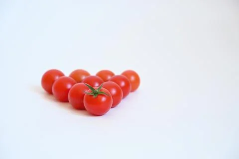 Fresh Cherry Tomatoes on White Background with Copy Space for Healthy Lifestyle Stock Photos