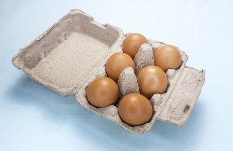 Fresh Chicken brown eggs on table Photos