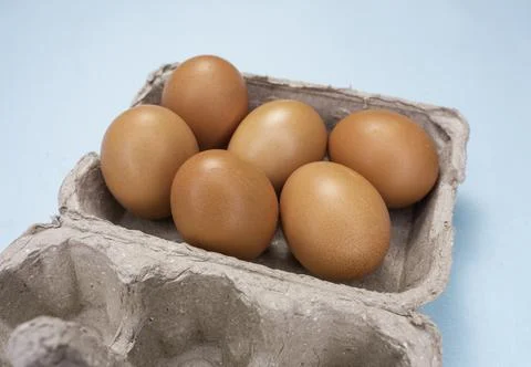 Fresh Chicken brown eggs on table Photos