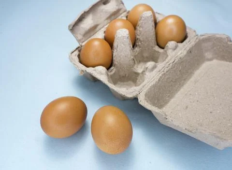 Fresh Chicken brown eggs on table Фото