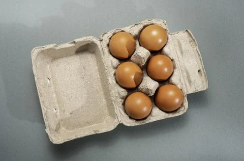 Fresh Chicken brown eggs on table Stock Photos