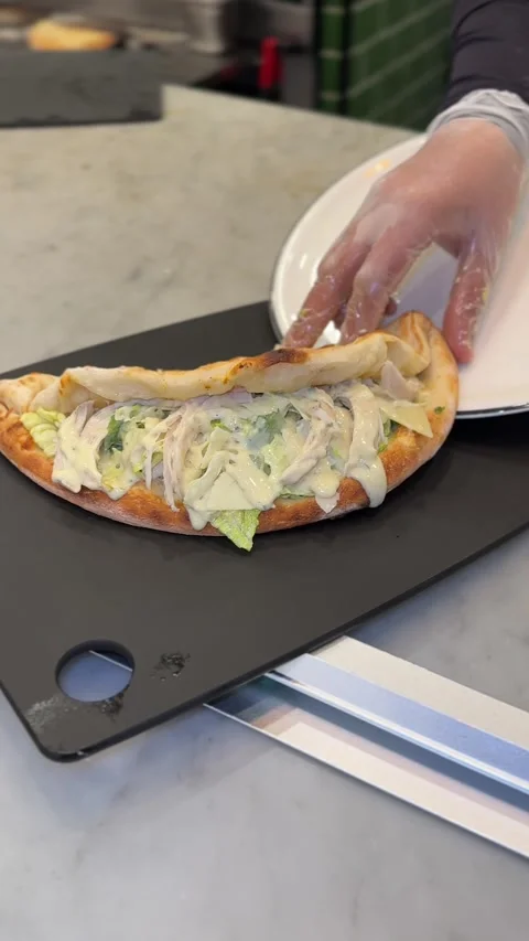 Fresh Chicken Caesar Sandwich Being Plated in Modern Kitchen – 4K Vertical. Stock Footage 310590232