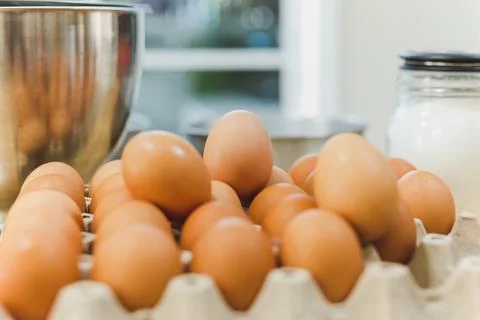 Fresh chicken egg with Ingredients for baking on the table. Stock Photos