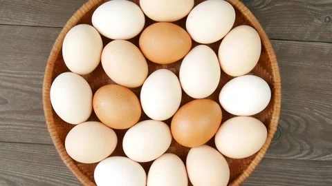 Fresh chicken eggs in a basket. Stock Footage 325174237