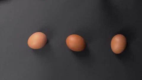 Fresh chicken eggs on a dark countertop. Stock Footage 281660449