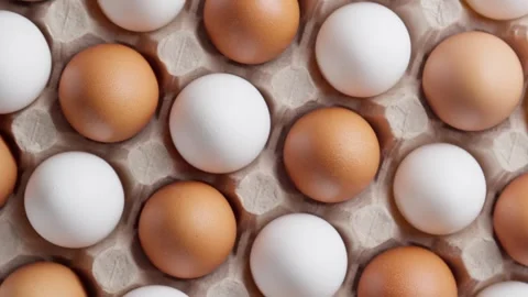 Fresh chicken eggs in packaging. Top view. Farm food concept. Protein. Stock Footage 303700835