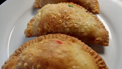 Fresh Chicken, Spinach and cheese empanadas from Peru 库存影片 340052871