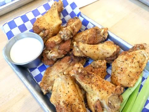 Fresh chicken wings Stock Photos