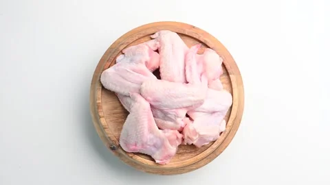 Fresh chicken wings ready for marinating and grilling at a local kitchen Stock Footage 305228343