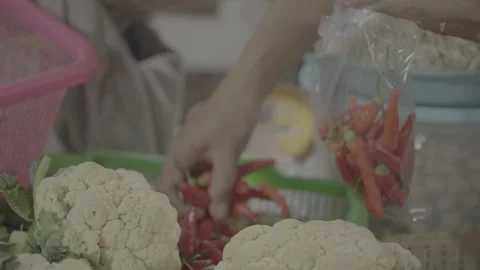 Fresh Chili Peppers Being Packed into Plastic Bags Slog3 10 bit 4:2:2 Stock-Footage 340183661