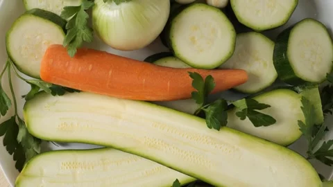 Fresh chopped vegetables rotating for healthy cooking Stock Footage 336464609