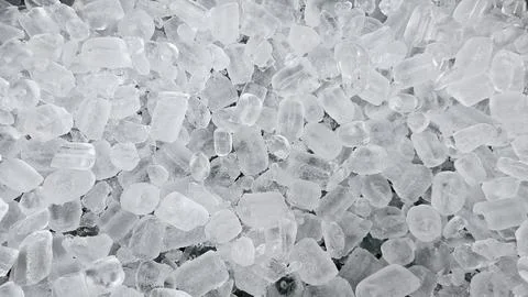 Fresh clear ice cubes background for drinks, cocktails, and freshness concepts Stock Photos