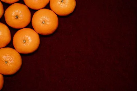 Fresh clementines on red background Stock Photos