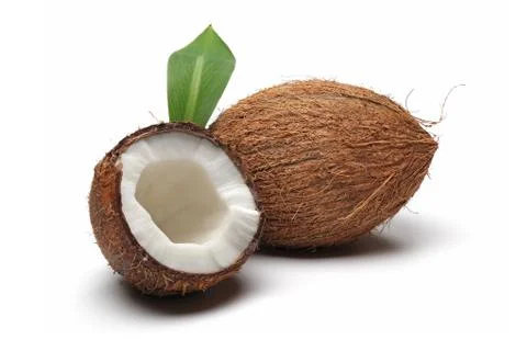 Fresh coconut broken in half with leaf isolated Stock Photos