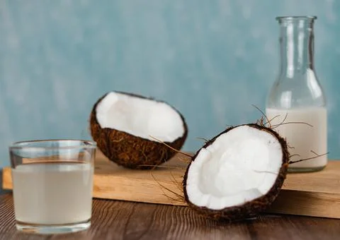 Fresh coconut fruit on table top Stock Photos