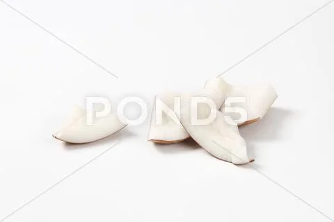 Fresh coconut pieces Stock Photos