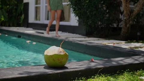 Fresh coconut at the poolside Stock Footage 250156348