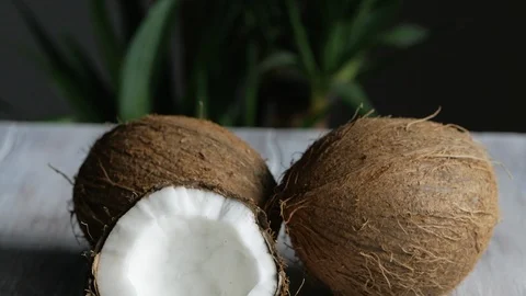 Fresh coconut on wooden table Stock Footage 111004857