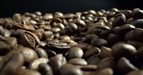 Fresh Coffee Beans With Dark Background. Close-up dolly shot. Concept premium Stock Footage 145132240