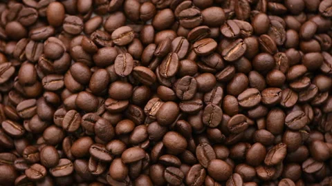 Fresh Coffee Beans from top view . Camera rotates slowly Stock Footage 278412631
