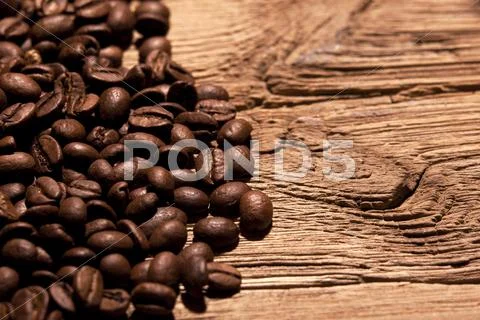 Fresh Coffee Beans On Wood