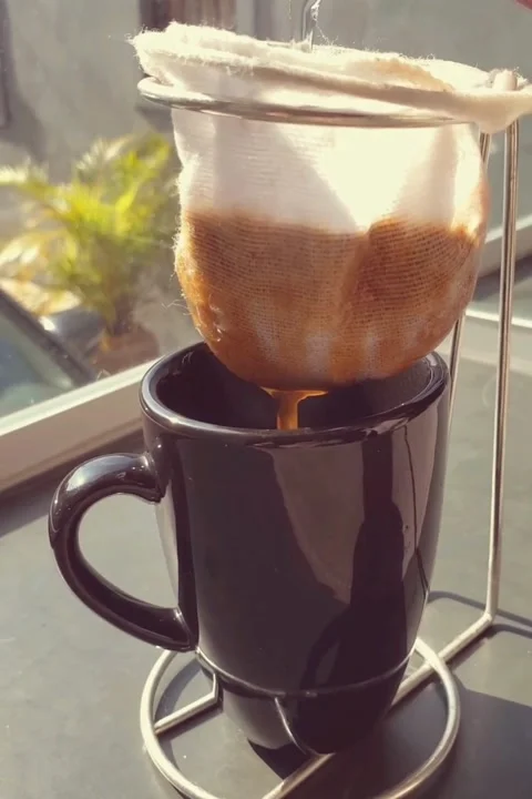 Fresh Coffee Pouring into a Small Cup | Close-Up Stock Footage 315005339