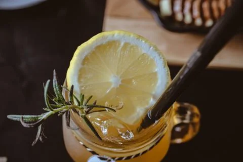 Fresh cold tea with slice of lemon in mason jar Stock Photos