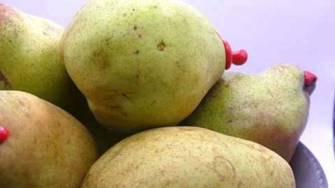Fresh Comice pears rotating for fruit presentation Stock-Footage 347011884