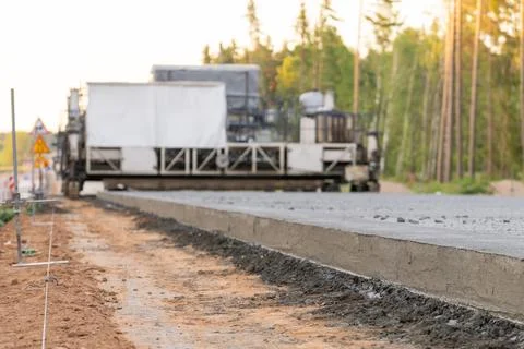 Fresh concrete curb under construction beside a road Foto stock